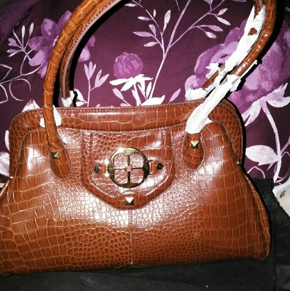 Iman purse brand new